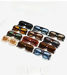 Detailed top view of various oversized square sunglasses in assorted colors and patterns