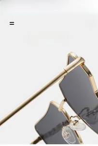 Makro-Detail der goldenen Metallgestell-Sonnenbrille mit integrierten Silikon-Nasenpads