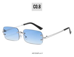 Detail view of rimless rectangular sunglasses with blue gradient lenses and silver frame