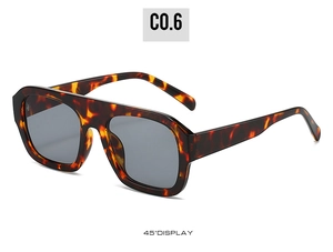 Detailed 45-degree view of square tortoise shell sunglasses with dark grey lenses