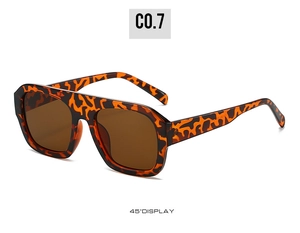 Detailed 45-degree angle view of leopard print square sunglasses with brown lenses