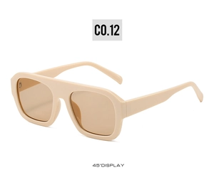 Detail view of beige oversized square sunglasses with a wide bridge from a 45-degree angle