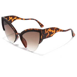Cat-eye outdoor cycling sunglasses with leopard pattern frame and gradient brown lenses