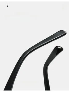 Detail of curved ergonomic temple tips on black oversized square fashion sunglasses