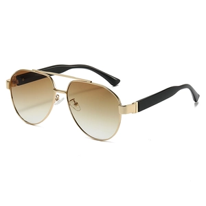Classic gold aviator sunglasses with brown gradient lenses and double bridge design