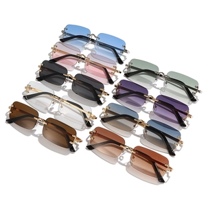 Fashionable rimless square sunglasses with gold metal frame and colorful gradient lenses
