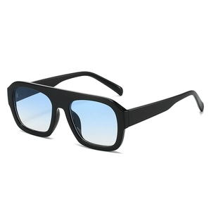 Fashionable oversized square sunglasses with black frames and blue gradient lenses
