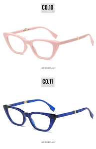 Detailed 45-degree view of pink and blue cat eye folding sunglasses with metal hinges