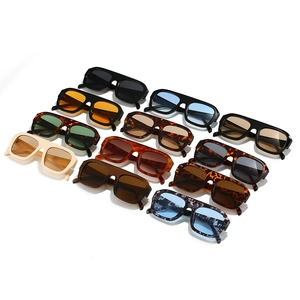 Retro oversized square sunglasses in multiple colors with thick frames and solid lenses