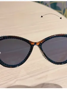Macro view of comfortable nose pads and sparkling rhinestones on cat-eye sunglasses
