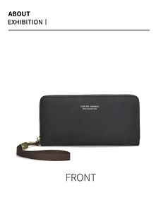 Gros plan sur le portefeuille long noir zippé avec texture cuir litchi et dragonne fixe