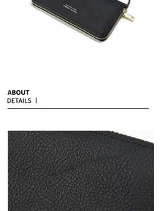 Détail du cuir synthétique noir à grain de litchi et fermeture éclair dorée du portefeuille