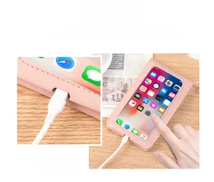 Detail view of the pink PU leather crossbody phone bag with touch screen and charging hole