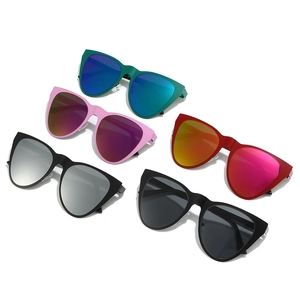 Five pairs of vintage cat-eye sunglasses with matte frames and colorful mirror lenses