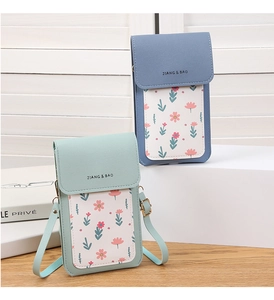 Detail view of mini crossbody phone bags with floral print and adjustable straps