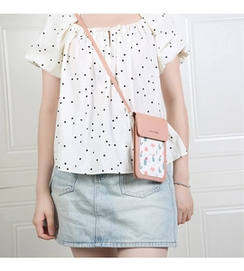 Pink touch-screen crossbody phone bag with floral pattern and JIANG & BAO print