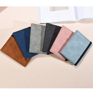 Detailed fan-shaped display of multi-color PU leather RFID passport holders and travel wallets