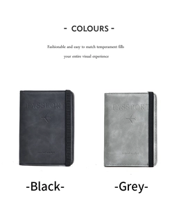 Detail view of black and grey PU leather travel wallets with elastic closure bands