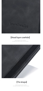 Detail of black head layer cowhide travel wallet showing tie straps and grain texture