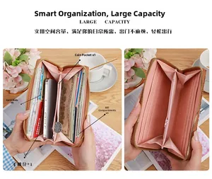 Detail of zippered long wallet showing 8 card slots and large capacity interior layout