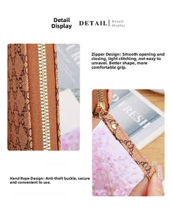 Detail of vintage monogram long wallet featuring smooth metal zipper and wrist strap