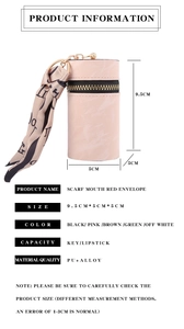 Pink cylindrical PU leather mini pouch with silk scarf detail and size specs 9.5x5cm