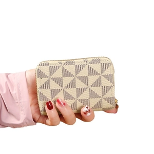 Handheld small card holder with geometric triangle pattern and gold zipper detail