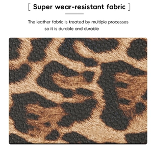Macro shot of durable leopard print synthetic leather with a classic lychee texture