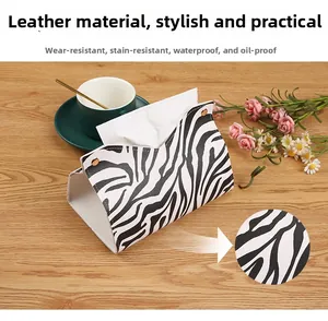 Macro shot of waterproof zebra pattern leather tissue box with elegant metal buttons