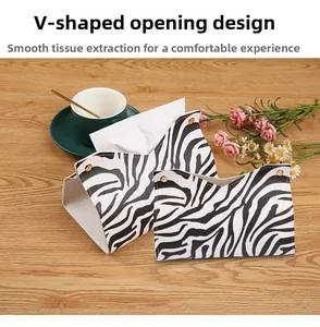 Detail of zebra pattern PU leather tissue box with metal snaps and V-shaped opening