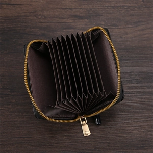 Short black straw pattern accordion wallet with 10 card slots and gold zipper closure