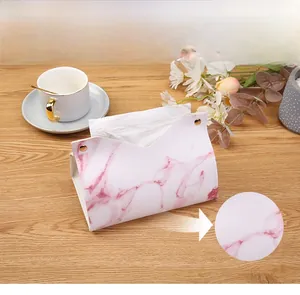 Close-up of pink marble leather tissue box with waterproof and wear-resistant texture