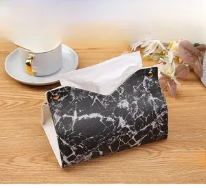 Close-up of black and white marble PU leather tissue box with metal snap button details
