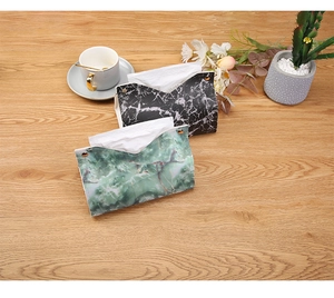 Detail view of foldable PU leather tissue box in black and green marble patterns