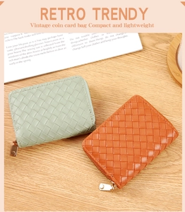 Close-up of woven leather credit card wallets with zipper closure and retro texture