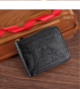 Detail of black PU leather wallet with vintage 100 dollar bill embossed pattern and zipper