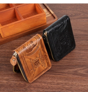 Detail view of retro dollar embossed men's short wallets in brown and black PU leather