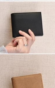 Close-up of men's short bifold wallet showing the textured black and brown wear-resistant fabric