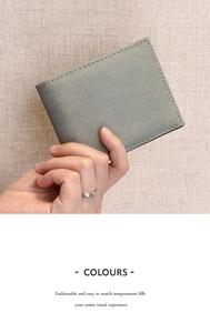 Close-up of a men's woven texture wallet held by hand featuring precise stitching details