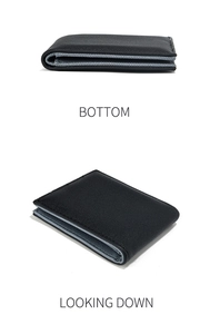 Detail view showing bottom and side perspective of durable black fabric men's wallet