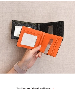 Detail of slim men's wallet with carbon fiber texture and metal money clip inside