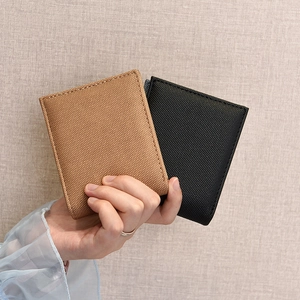 Minimalist men's short canvas wallet in khaki and black with multi-card slots