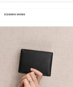 Handheld scenario showing compact carbon fiber men's wallet with multi-card slots