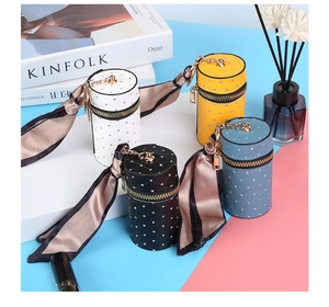 Mini cylinder luxury coin purses with diamond lattice pattern and silk scarf details