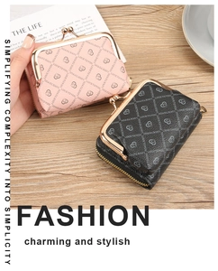 Close-up of stylish heart print coin purses with metal kiss-lock closure and compact design