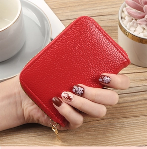 Handheld red lychee texture PU leather card holder with gold zipper and compact design