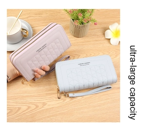 Dual zipper long wallets with wave stitching pattern and detachable wrist straps