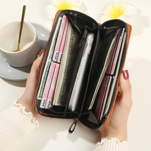 Brown leather long wallet with large capacity compartments for cards and phone