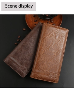 Detailed view of long textured leather wallets in brown and dark coffee with diamond stitching