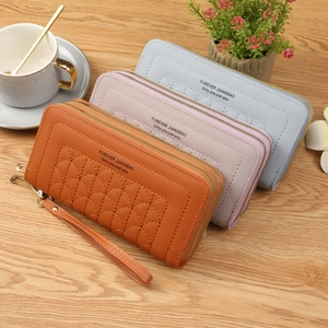 Stylish long double zipper wallet for women with quilted pattern and wrist strap